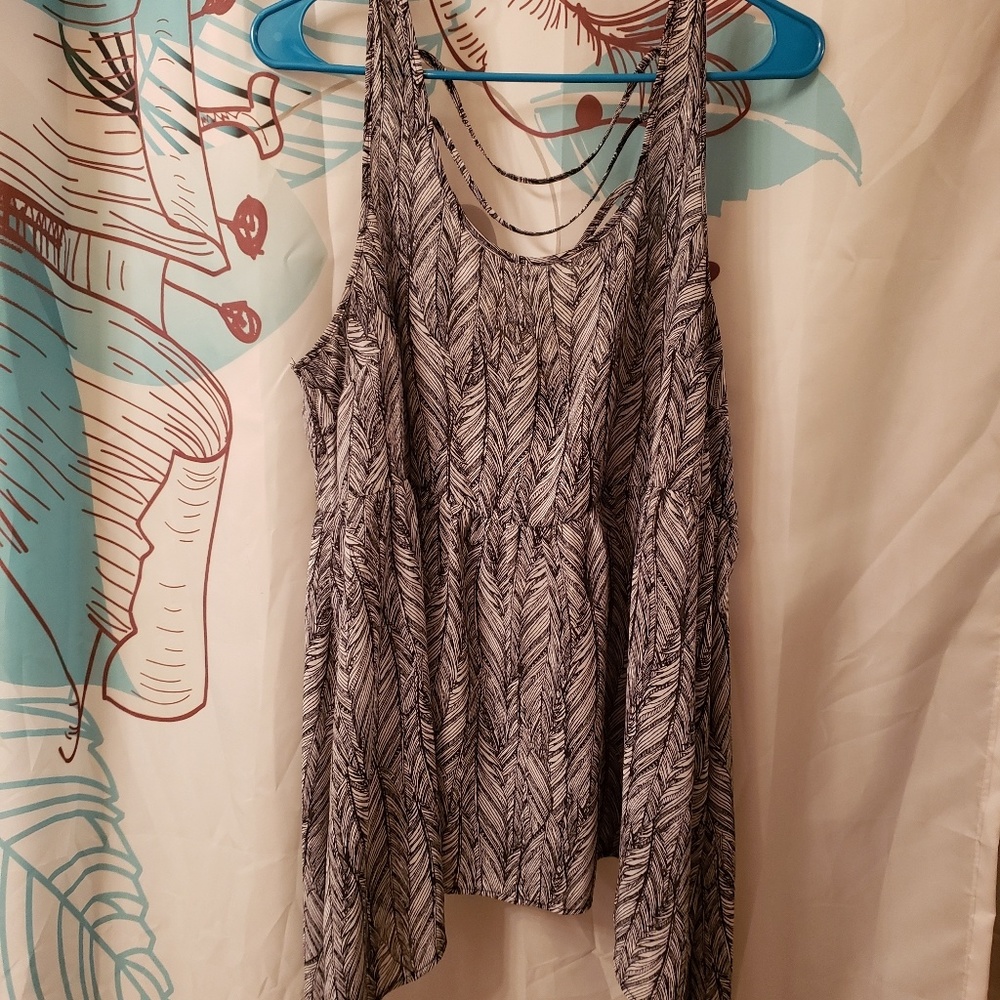 Sheer top with feather design